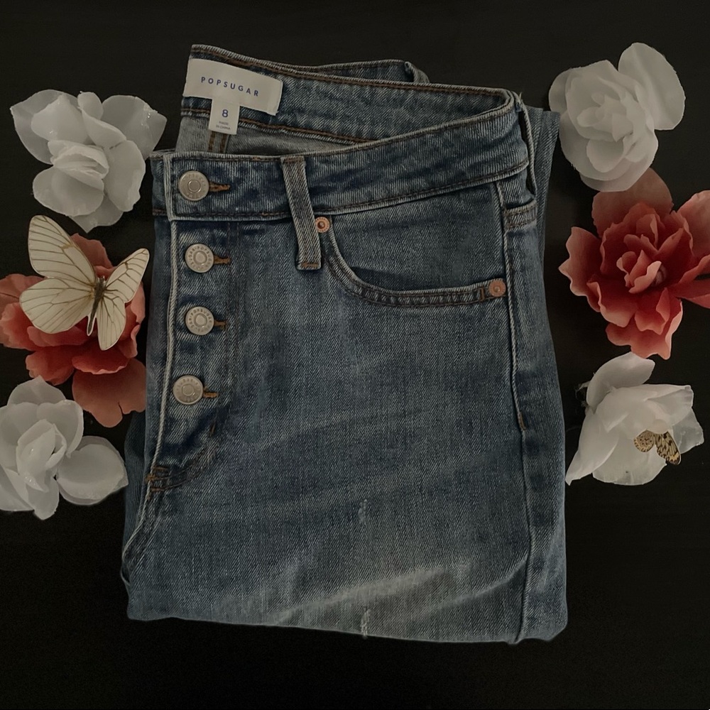 Medium washed, button, straight leg jeans. Size 8.